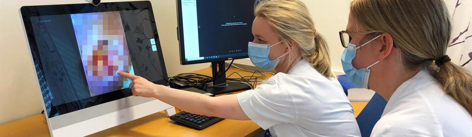 Videokonsultasjon. Digital sårtjeneste. To leger på video